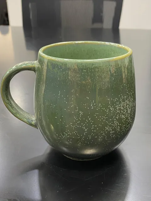 Caneca bojuda verde mesclada