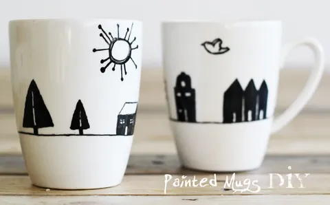 Par de canecas pintadas à mão com casinhas e árvores