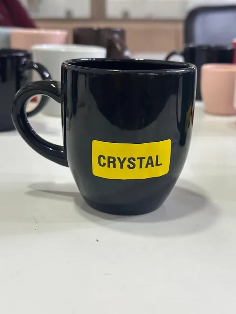 Caneca preta alta